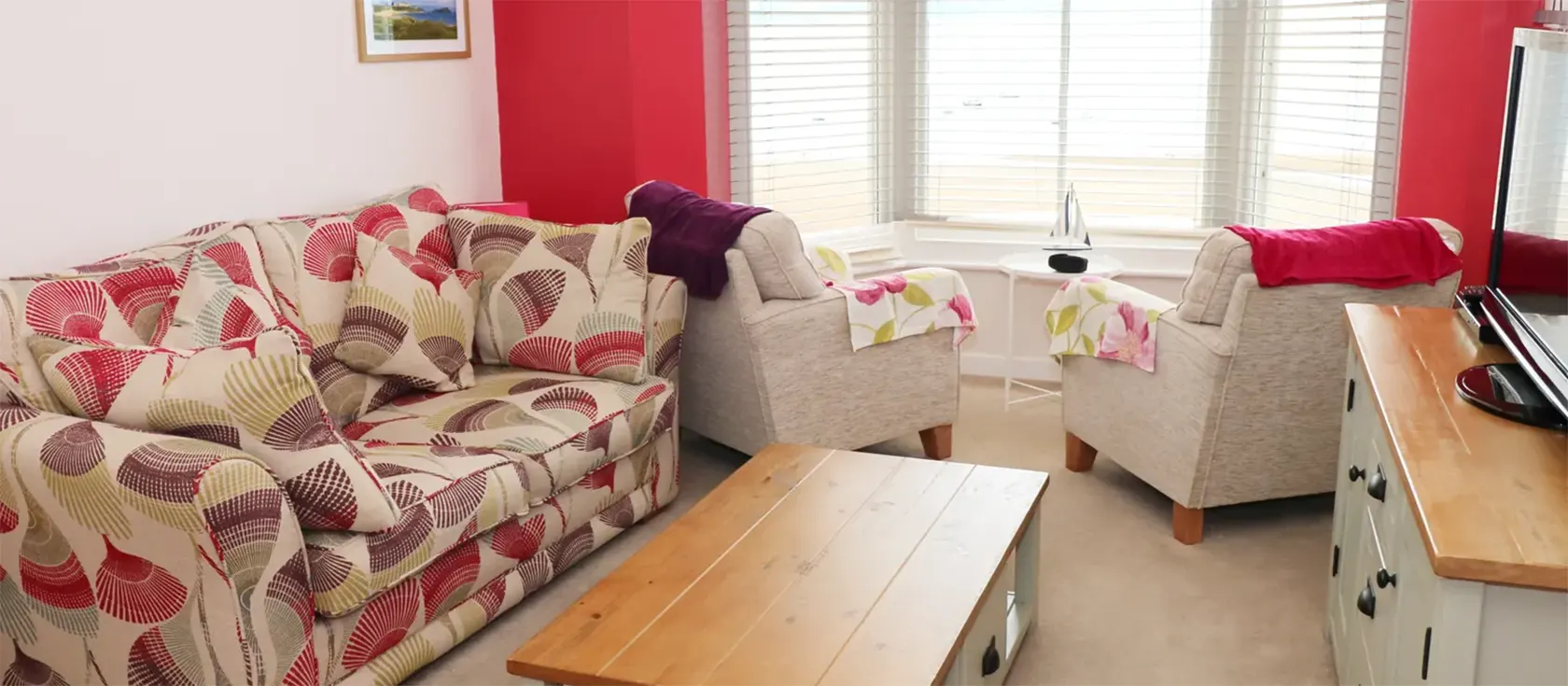 1 Beachtop Court is a fantastic apartment with stunning views of Tenby's harbour, castle, and beach from the lounge and bedroom. This pet-friendly, first-floor flat sleeps four in one double bedroom and one sofa bed and is just 200m from the sand.