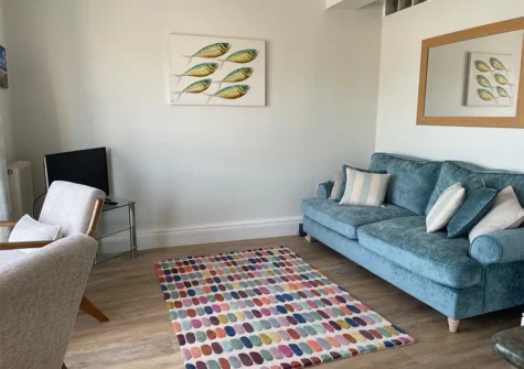 The living area at 1 Goscar Court, Tenby