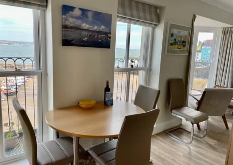 The dining area at 1 Goscar Court, Tenby