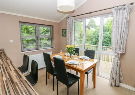 The dining area at 1 Hornbeam Lodge, Camp Hill
