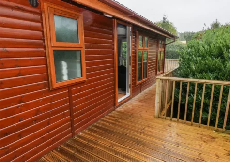 The decked verandah at 1 Hornbeam Lodge, Camp Hill