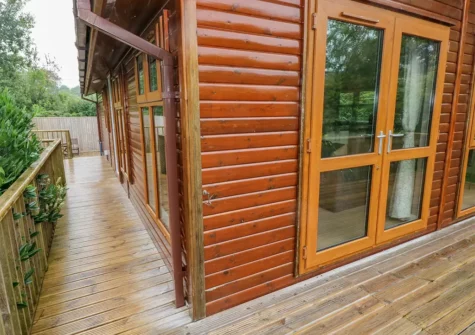 The decked verandah at 1 Hornbeam Lodge, Camp Hill