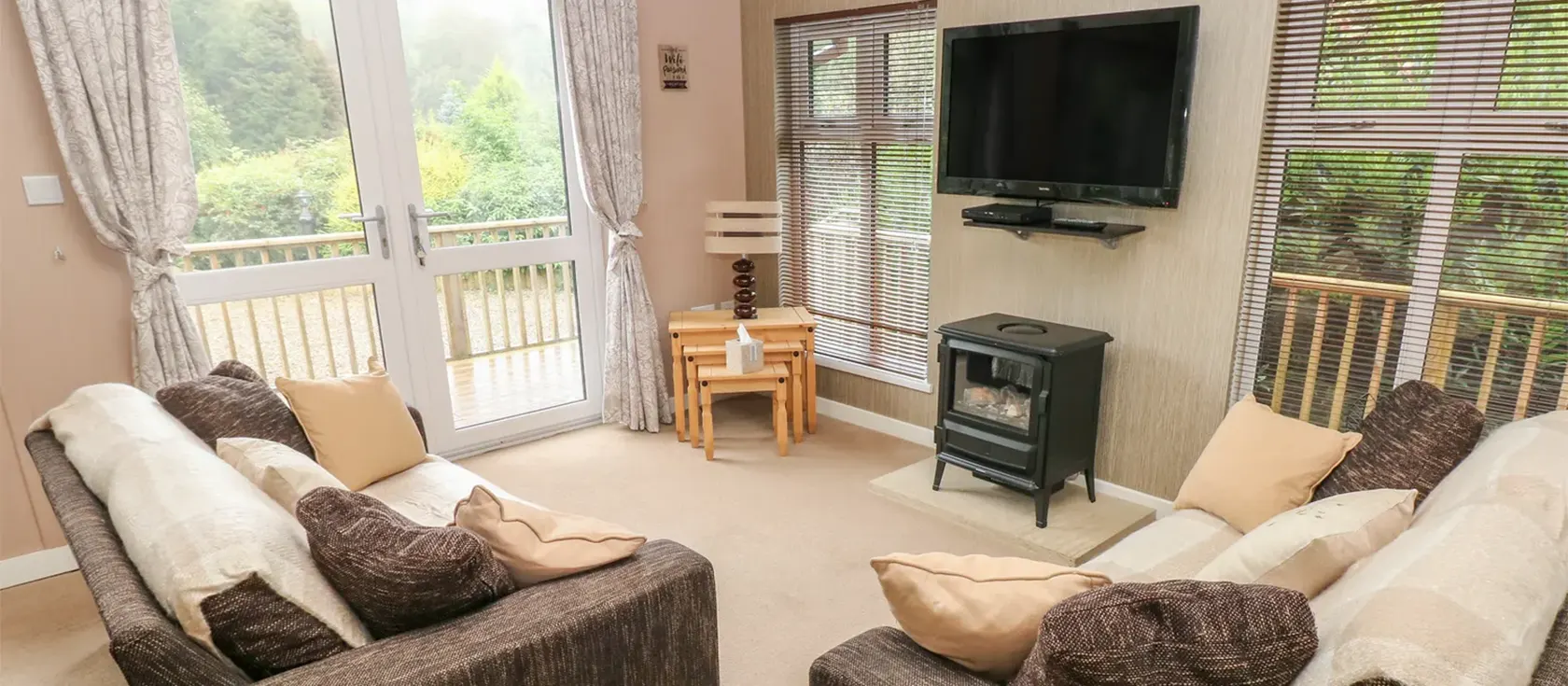 1 Hornbeam Lodge, Camp Hill, is a fantastic rural retreat on the outskirts of Narberth. This atmospheric wooden lodge has a spacious open-plan living area, two bedrooms, two bathrooms, a wrap-around veranda, a furnished patio and a private hot tub.