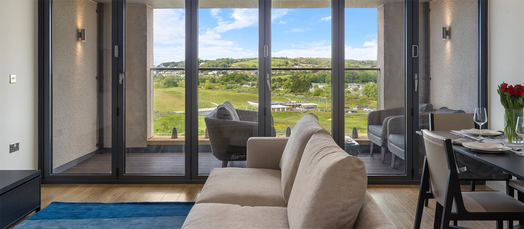 10 Waterstone House, Tenby is a luxurious seaside apartment with three bedrooms, two bathrooms, and a balcony offering stunning sea views. It's located just a two-minute walk from the Blue Flag winning South Beach and close to local amenities