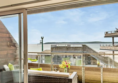 Step out on to the balcony at 11 Waters Edge, Tenby