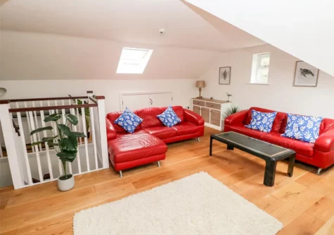 The living area at 22 Giltar House, Tenby