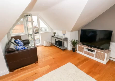 The living area at 22 Giltar House, Tenby