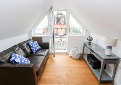 The living area at 22 Giltar House, Tenby