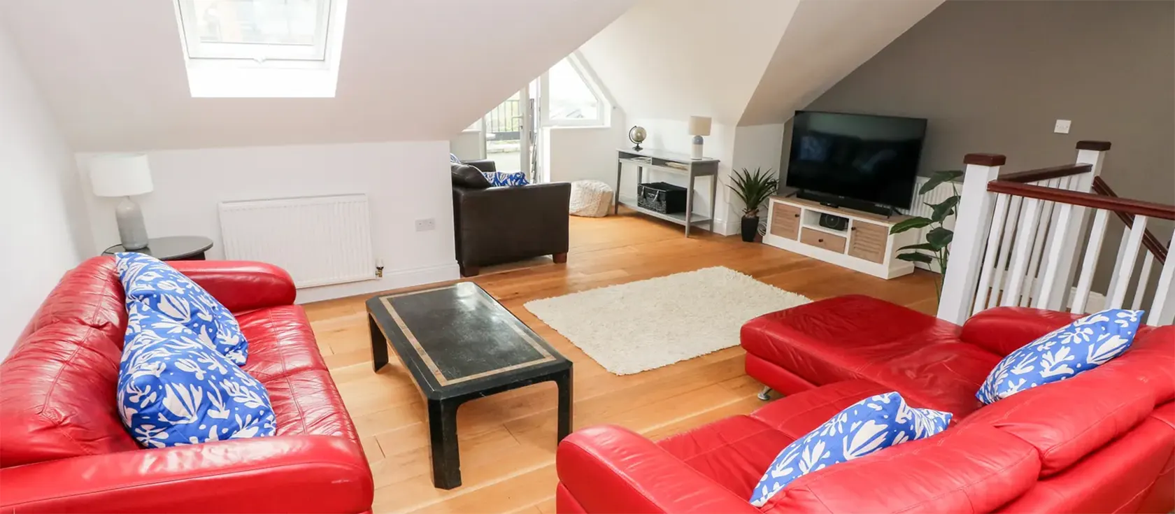 22 Giltar House, Tenby is an elegant three-storey property with a sea view roof terrace and ground floor courtyard. This property sleeps eight in four bedrooms, is pet friendly, and comes with parking and access to a shared pool, sauna and gym.