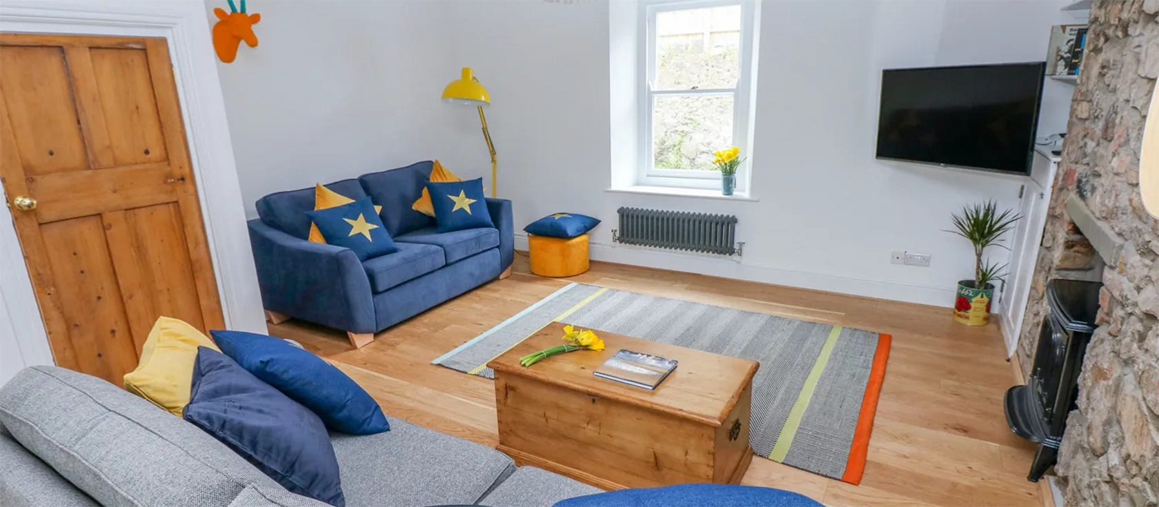 5 Park Place, Tenby is a characterful property with spacious, airy rooms and colourful decor. Relax in the large lounge, get creative in the quirky kitchen, dine alfresco in the courtyard garden, and then retire to the three minimalist bedrooms.