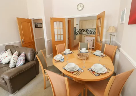 The dining area at 6 South Beach Court, Tenby