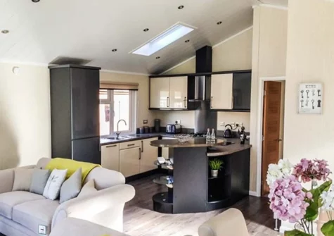 The living area & kitchen at 95 The Haven, Heritage Park, Stepaside