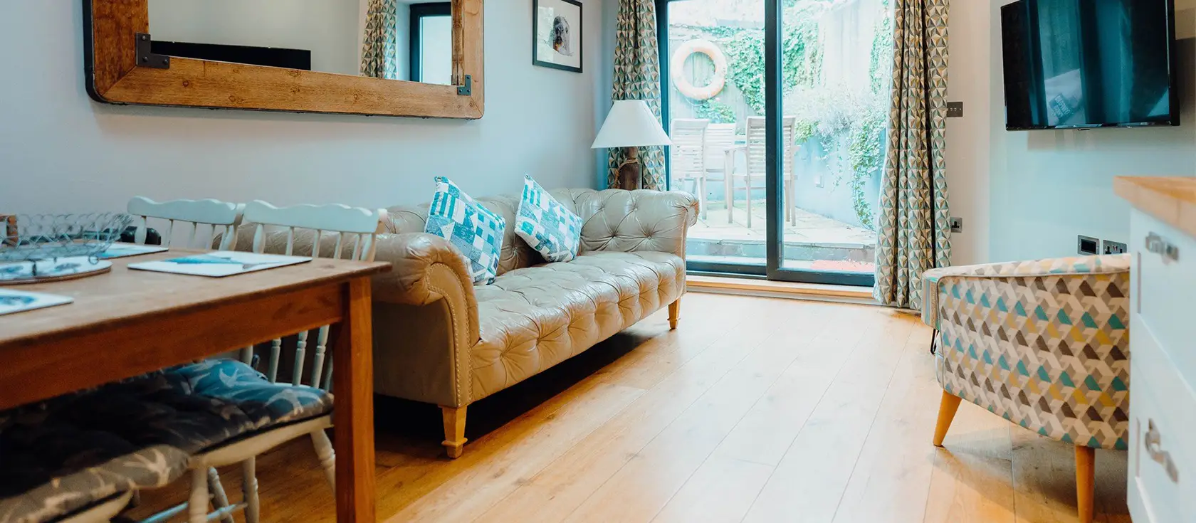 Albert View 1, Tenby is a stylish ground-floor apartment just steps from medieval walls, golden beaches & a picturesque harbour. With two bedrooms, a sun-trap courtyard and contemporary interiors, it's perfect for families seeking coastal adventure.
