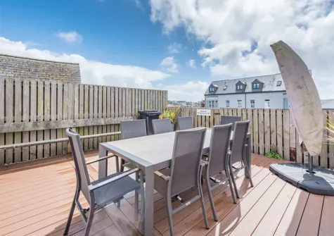 The roof terrace & alfresco dining area at Berlin House, Tenby