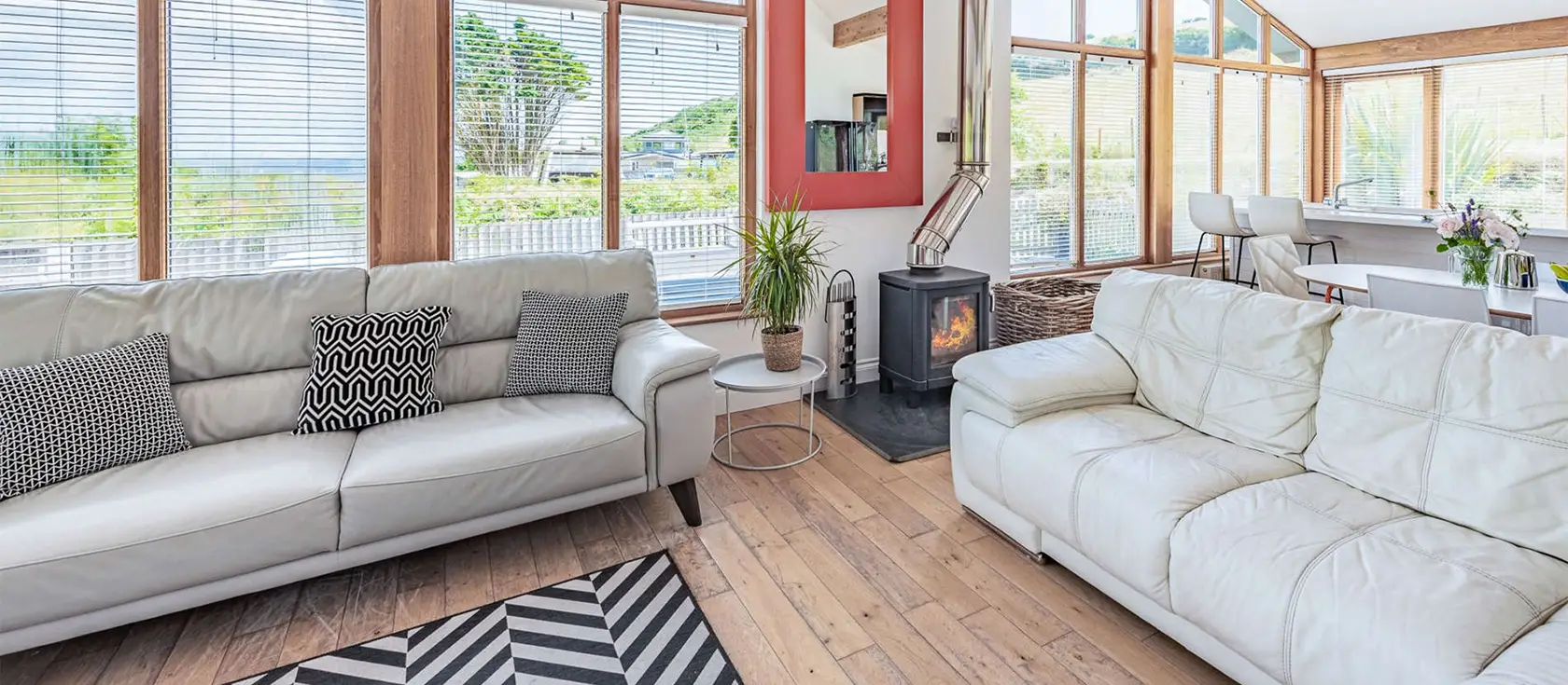 Boathouse On The Beach, Freshwater East is a stunning beachfront cottage with modern amenities and cosy bedrooms nestled in the sand dunes, offering direct beach access, stunning coastal walks, nearby amenities, and easy reach to popular attractions.