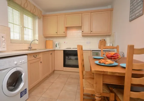 The kitchen & dining area at Broad Haven Beach Cottage, Broad Haven