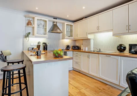 The kitchen at Caldey View 1, Tenby