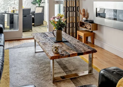 Caldey View 1, Tenby is a stylish basement apartment with open-plan living, two comfortable bedrooms, and a charming patio. Just steps from historic attractions and sandy beaches, it's the perfect base for exploring Pembrokeshire's coastal wonders.