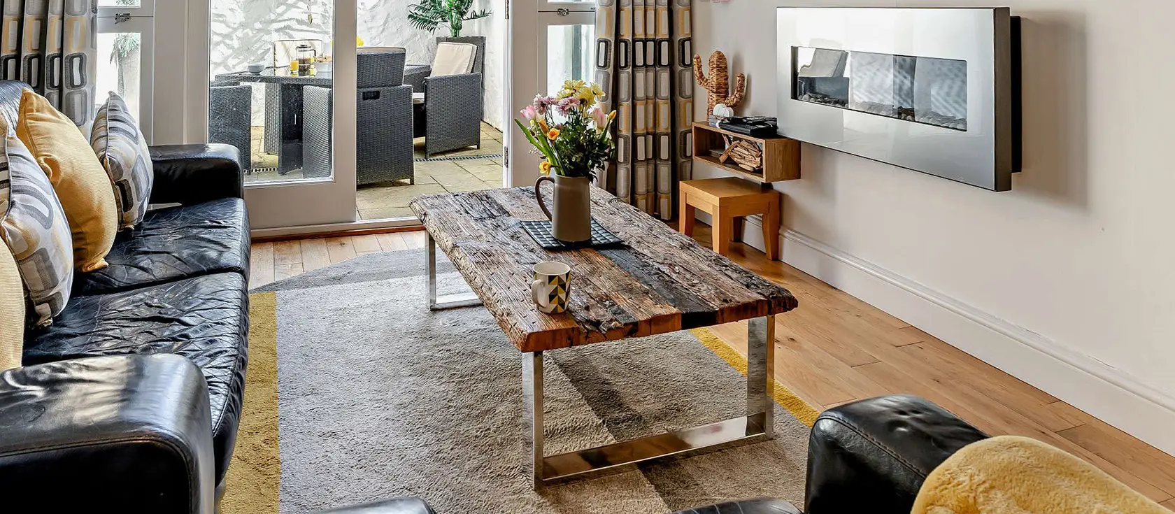 Caldey View 1, Tenby is a stylish basement apartment with open-plan living, two comfortable bedrooms, and a charming patio. Just steps from historic attractions and sandy beaches, it's the perfect base for exploring Pembrokeshire's coastal wonders.