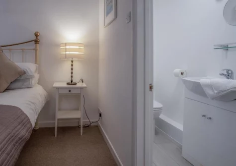 Bedroom #1 & en-suite at Caleb's Cottage, Solva