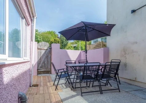 The patio, barbecue & alfresco dining area at Canol Y Bryn, Tenby