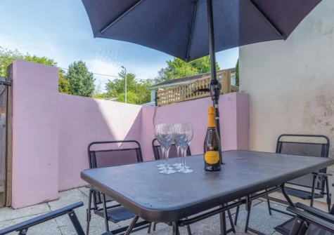 The patio, barbecue & alfresco dining area at Canol Y Bryn, Tenby