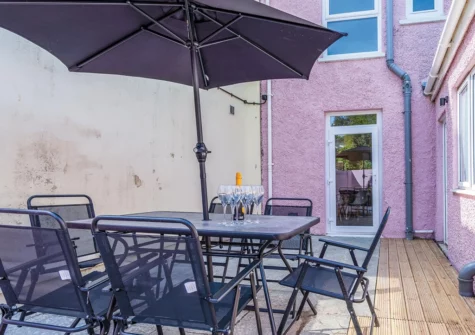 The patio, barbecue & alfresco dining area at Canol Y Bryn, Tenby