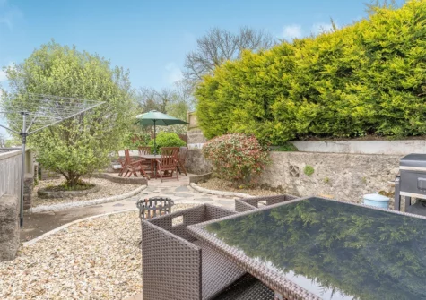 The patio, alfresco dining & barbecue area at Captiva Cottage, Saundersfoot