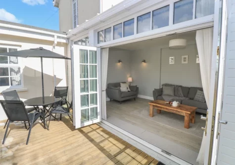 The decked patio & alfresco dining area at Castle at The Hideaway, Tenby