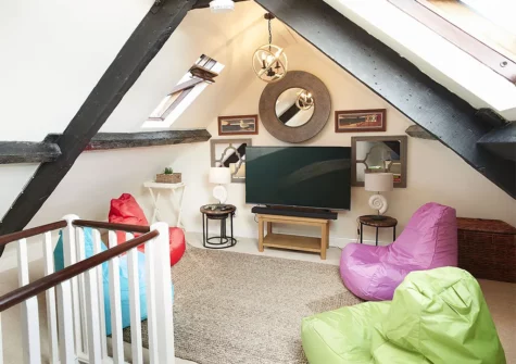 The loft TV room at Chart House, Tenby