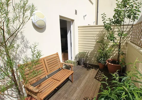 The decked balcony & outdoor sitting area at Cobourg House 4, Tenby