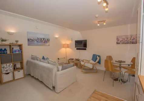 The living & dining area at Cobra House, Tenby