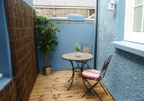 The decked courtyard at Cobra House, Tenby