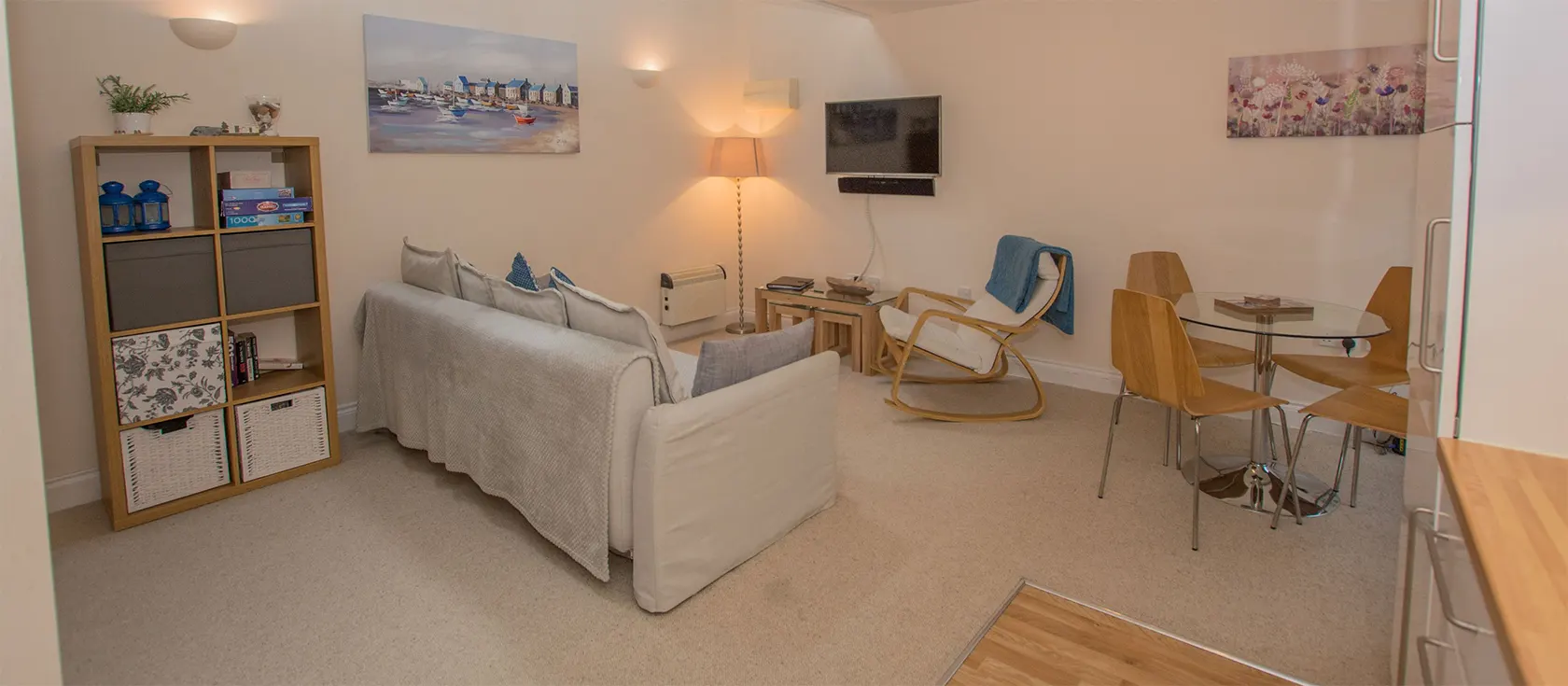 Cobra House, Tenby is a charming property suitable for families or groups of friends. A spiral staircase leads from the open plan living space to a lovely mezzanine bedroom with exposed wooden beams and skylights that flood the property with light.