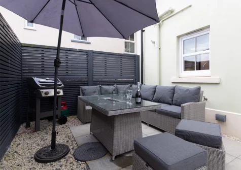 The courtyard, alfresco dining & barbecue area at Cottage Mews, Tenby