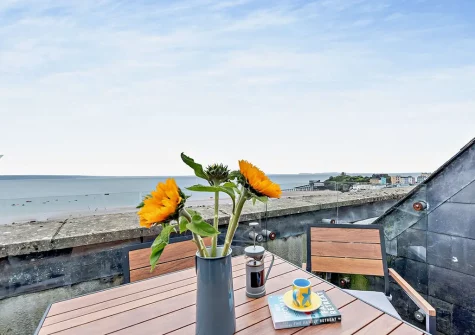 Bedroom #1 balcony & outdoor sitting area at Court House 9, Tenby