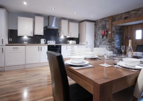 The kitchen & dining area at Fletcher Coach House, Llanmiloe