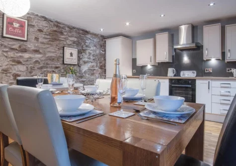 The dining area at Fletcher Coach House, Llanmiloe