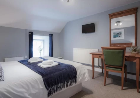 The bedroom #1 at Fletcher Coach House, Llanmiloe