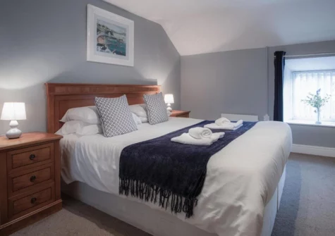 The bedroom #1 at Fletcher Coach House, Llanmiloe