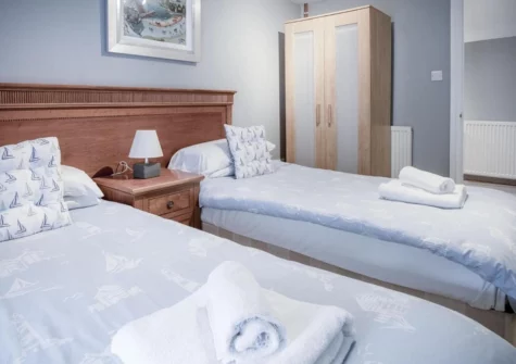 The bedroom #3 at Fletcher Coach House, Llanmiloe