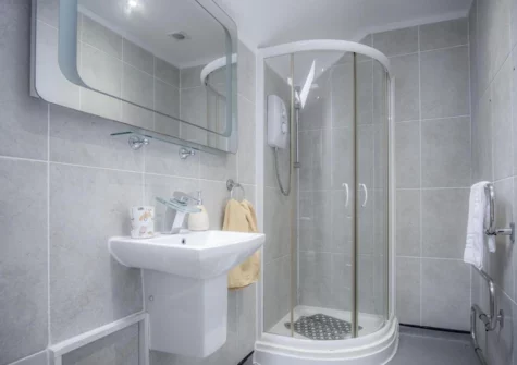 The bathroom at Fletcher Coach House, Llanmiloe