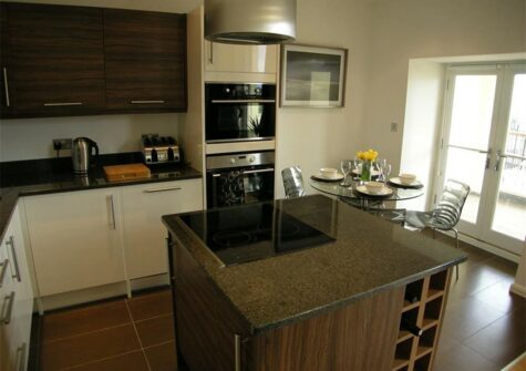The kitchen & dining area at Glendower House 4, Tenby