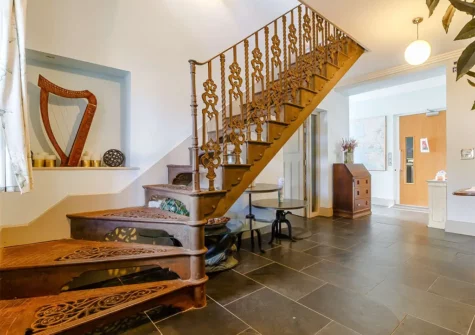 The entrance hallway & stairs to the first floor at Globe House, Angle