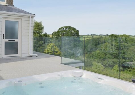 The elevated terrace & hot tub at Green Meadow, St Dogmaels