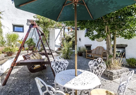 The communal courtyard at Hall House, St Florence
