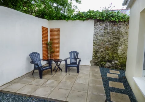 The enclosed courtyard at Harbour Beach at The Hideaway, Tenby