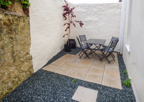 The enclosed courtyard at Harbour Beach at The Hideaway, Tenby