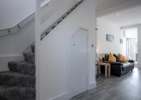 Stairs to the first floor at Hawtree Cottage, Tenby