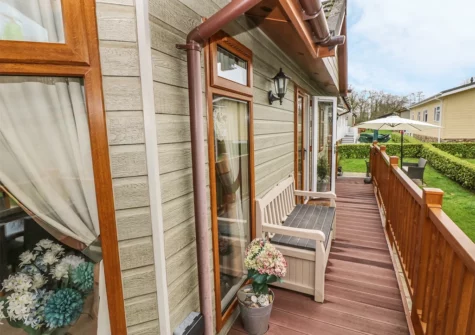 The decked patio at Heddwch, Heritage Park, Stepaside